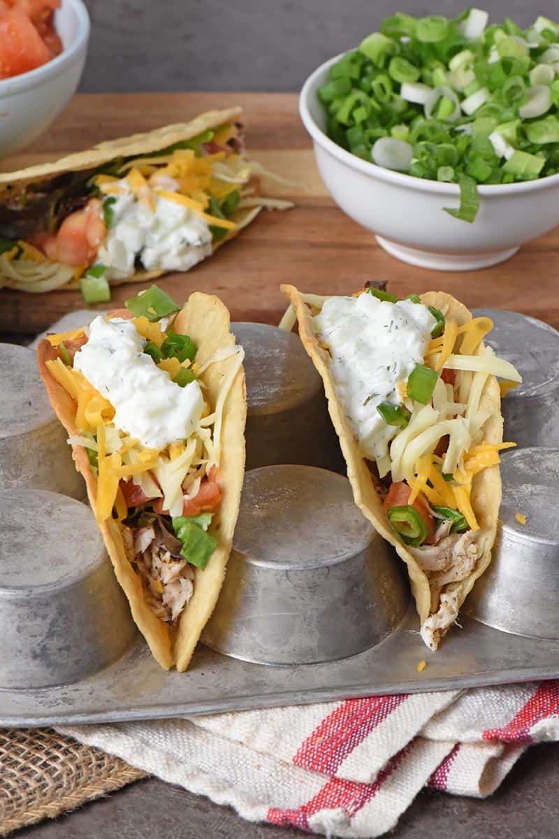 grilled fish tacos with a creamy tzatziki fish taco sauce in a muffin pan