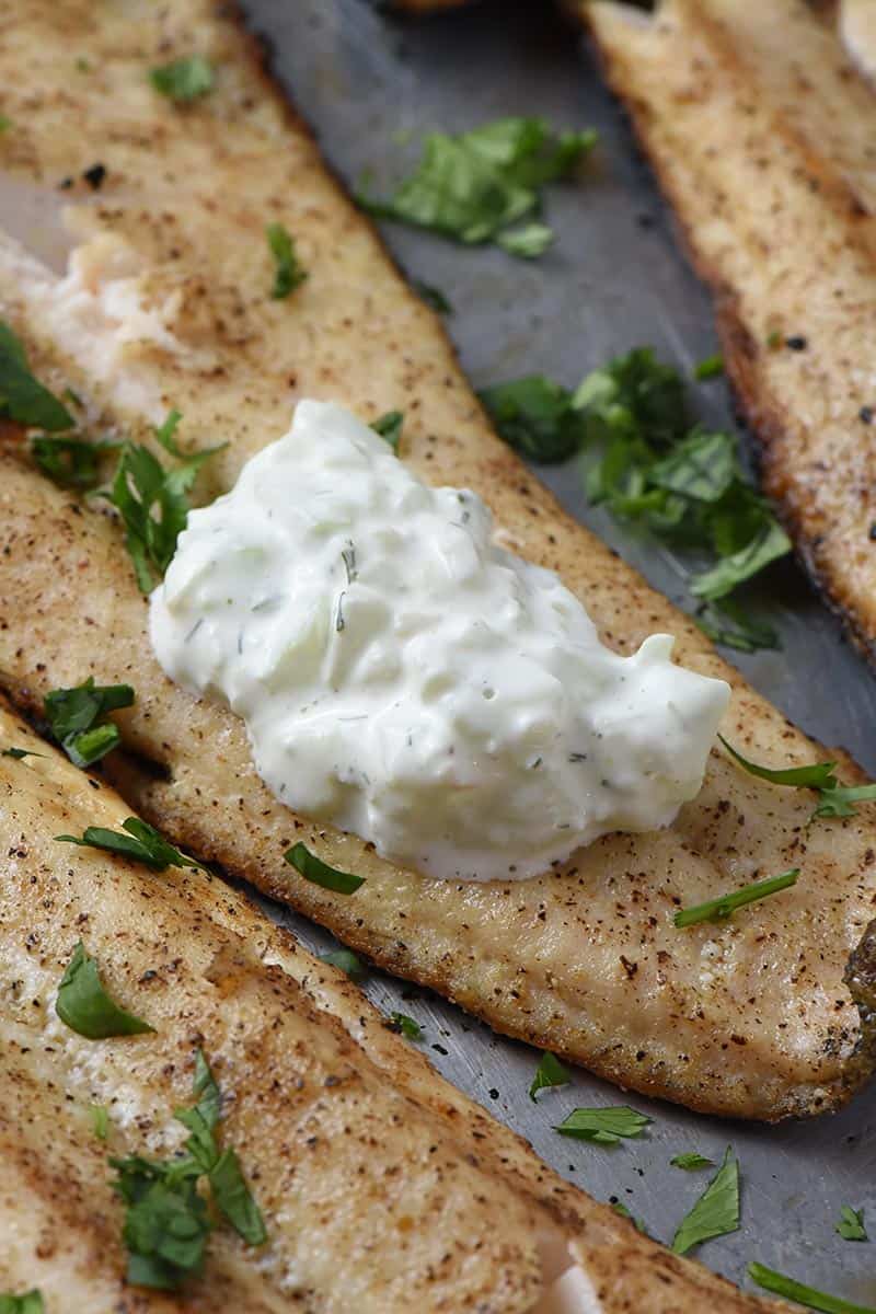 tzatziki sauce on grilled fish