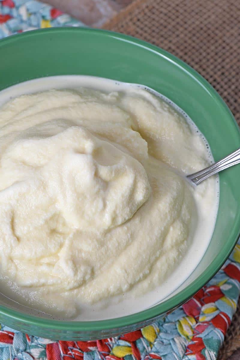 old fashioned ice cream in green pioneer woman bowl with spoon