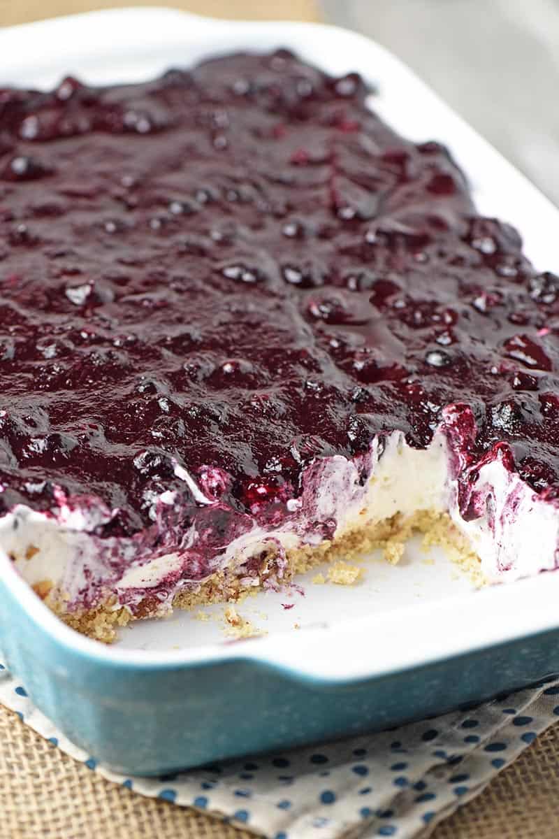 easy blueberry yum yum dessert recipe made in a blue baking dish