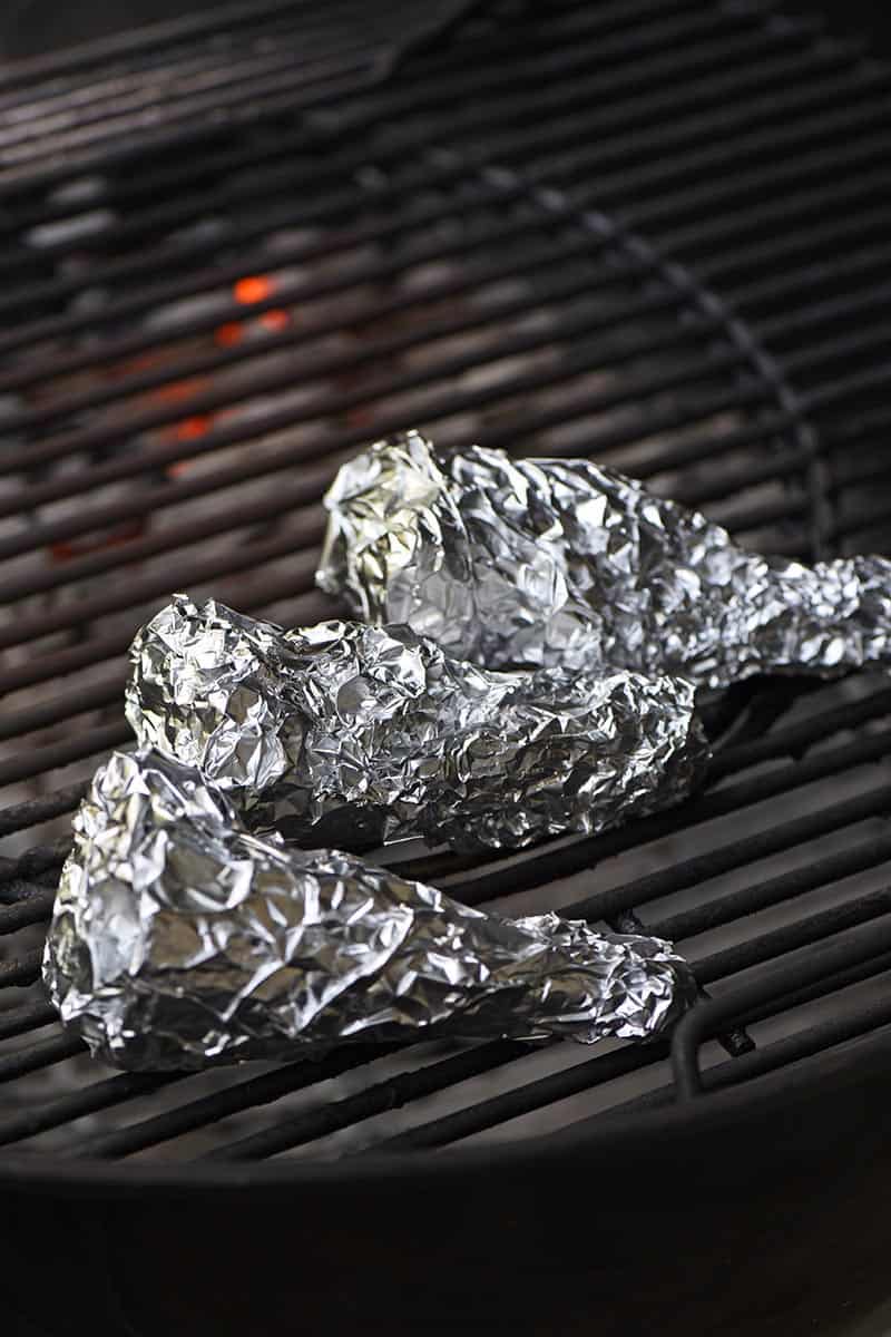 grilling ice cream cone s'mores on a charcoal grill