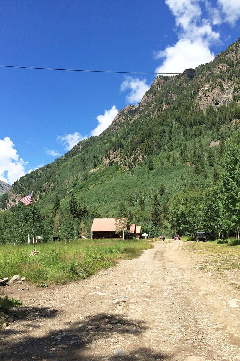 Crystal ghost town, Colorado, with cabins, a general store, and outhouse