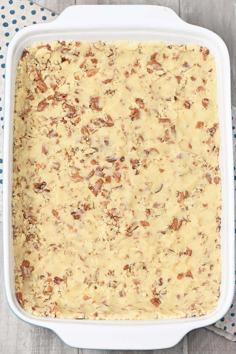 press in pie crust made with pecan nuts, flour, and butter