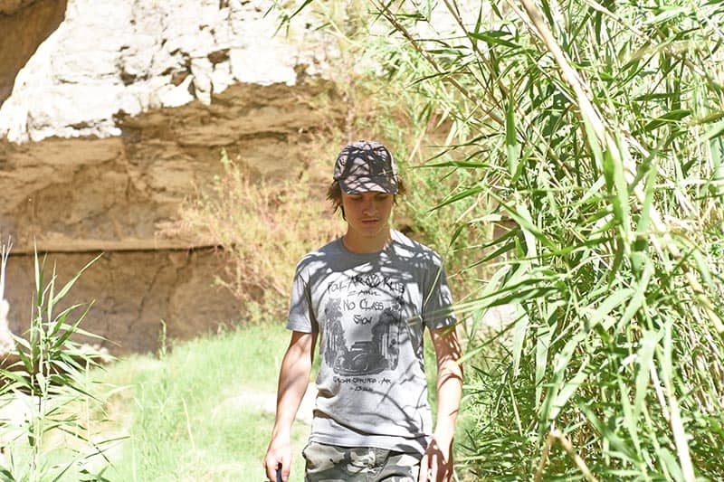 boy hiking in Santa Elena Canyon in West Texas