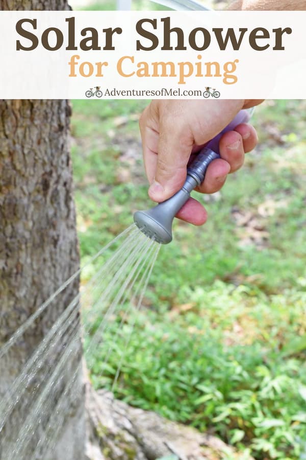 solar shower with removable shower head for easy showering outdoors