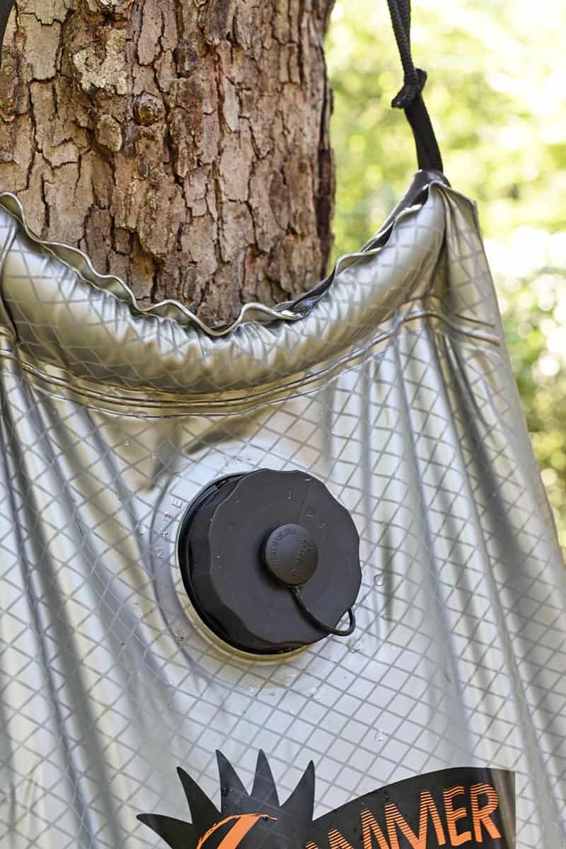 handy filling valve on solar shower for camping