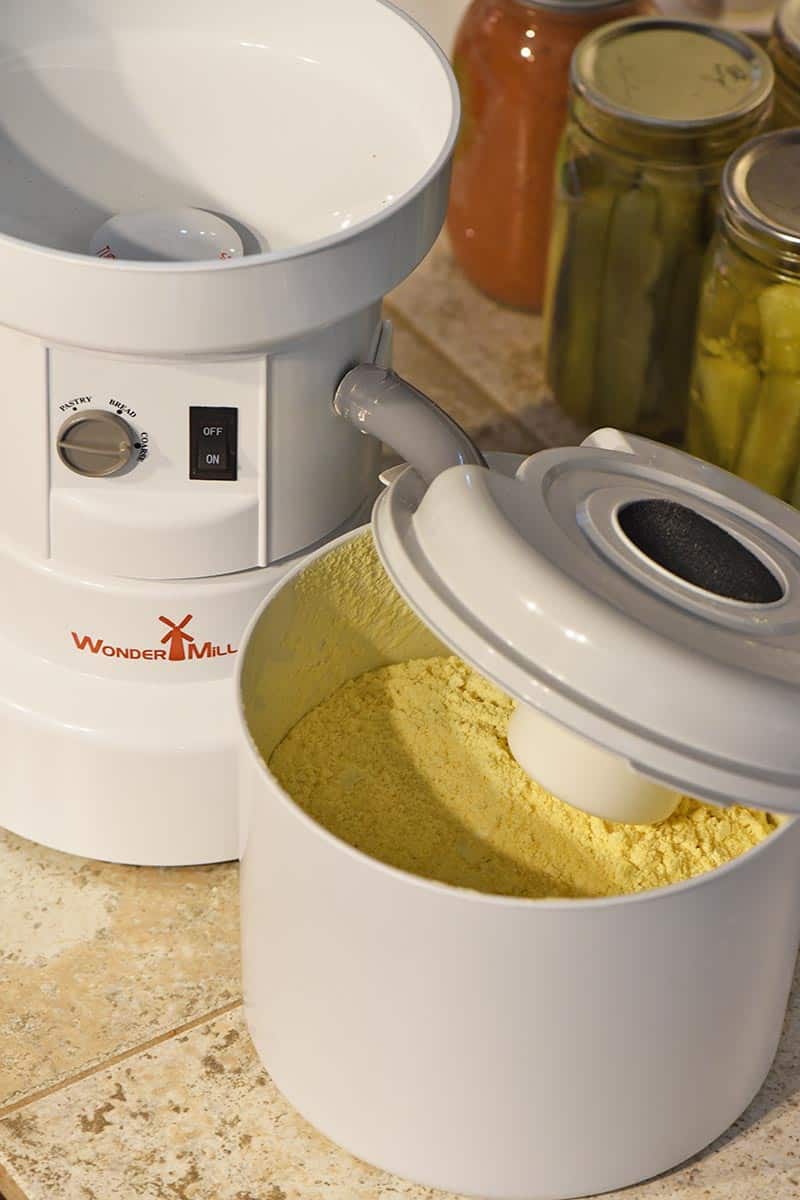 milling corn in the WonderMill Grain Mill for buttermilk cornbread from scratch