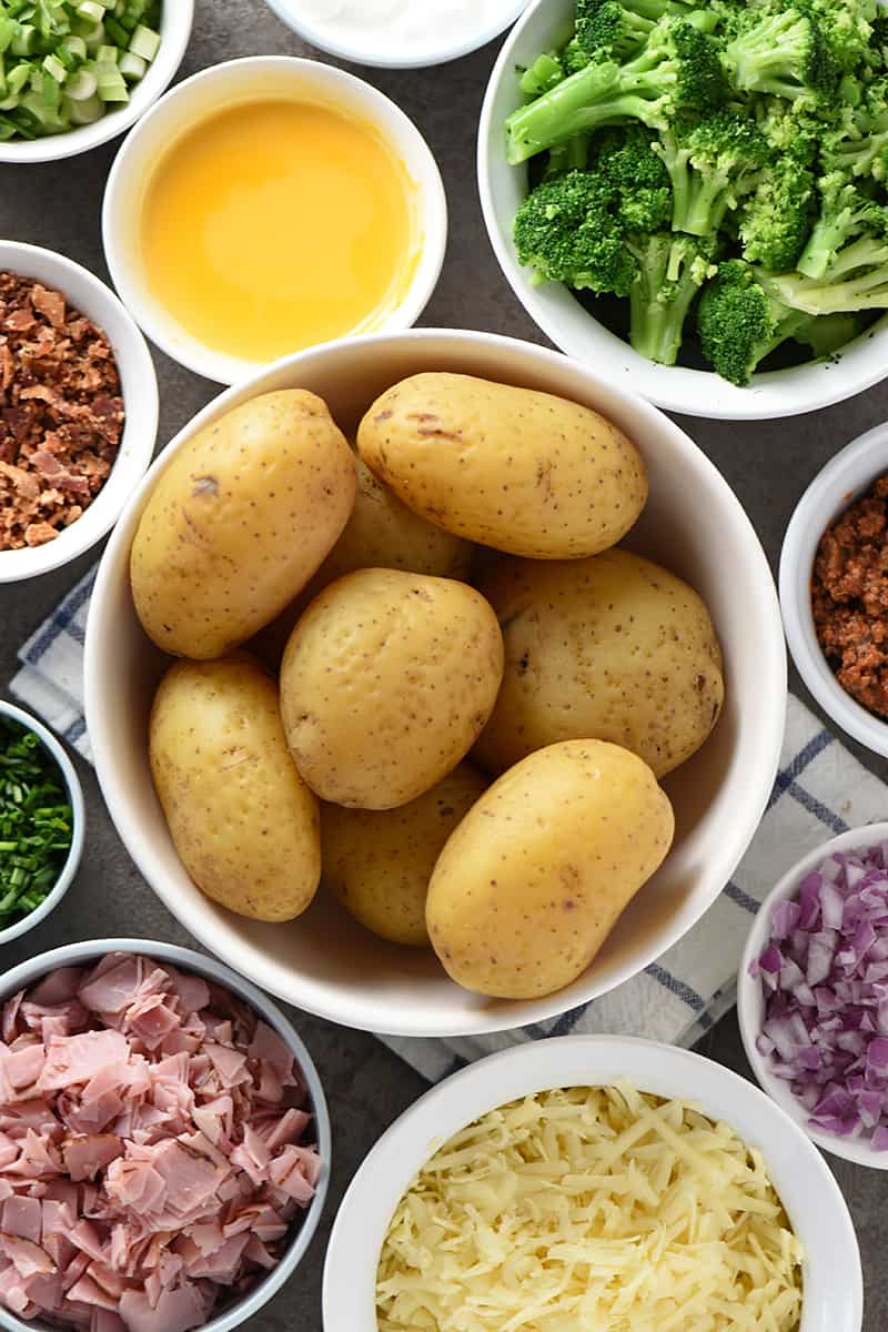 baked potato bar with baked potatoes and baked potato toppings