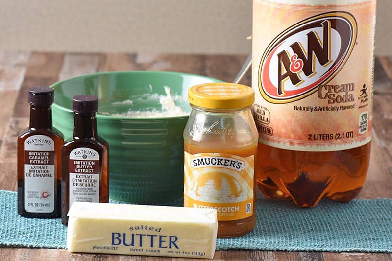 butterbeer ingredients for butterbeer recipe, including cream soda, butterscotch topping, caramel extract, butter extract, salted butter, and whipped cream