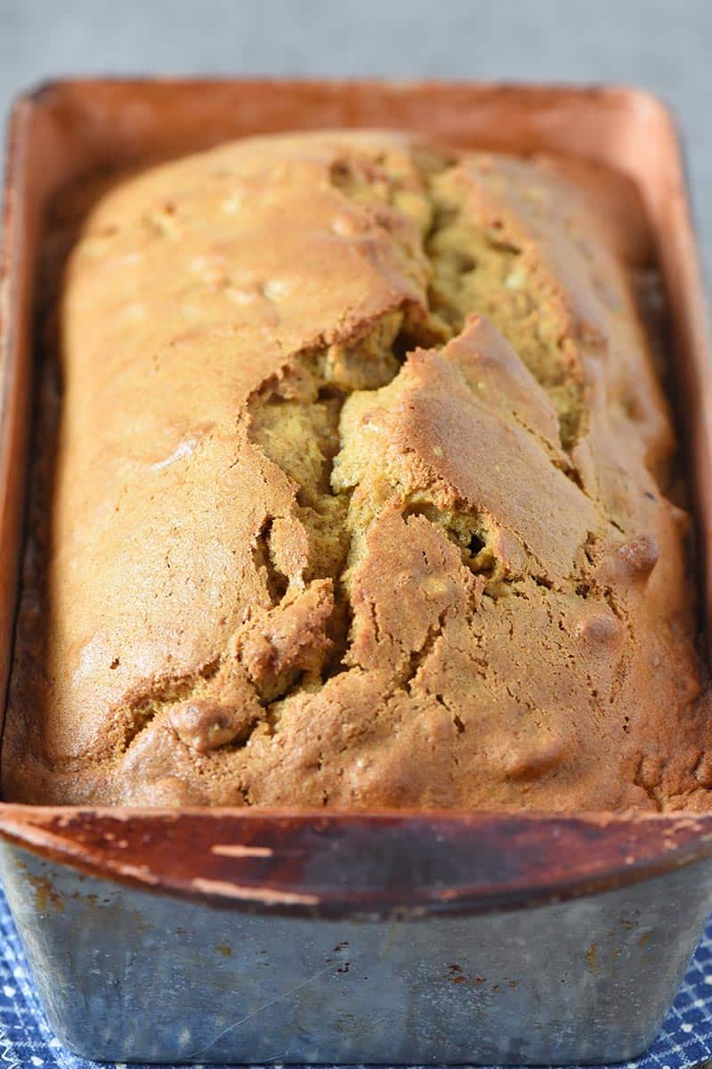 baked pumpkin bread loaf in bread loaf pan