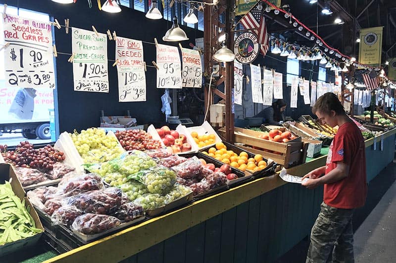 buying fresh produce at Soulard Market in St. Louis