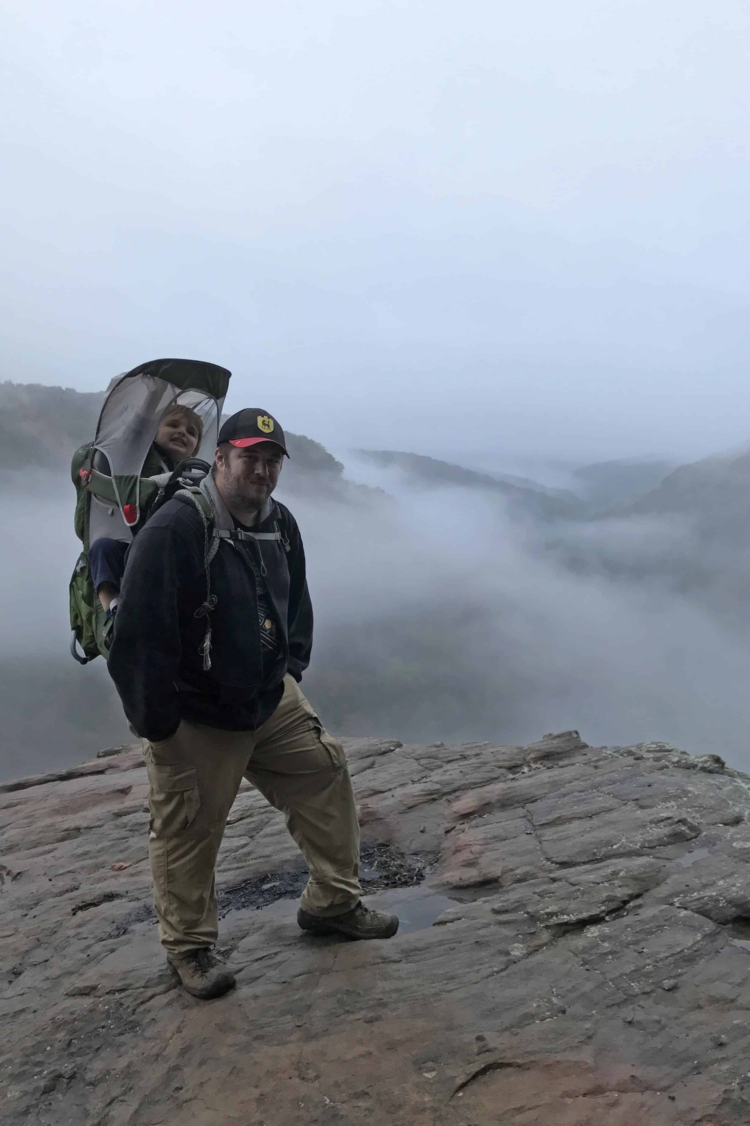 man and toddler on Hawksbill Crag in Arkansas