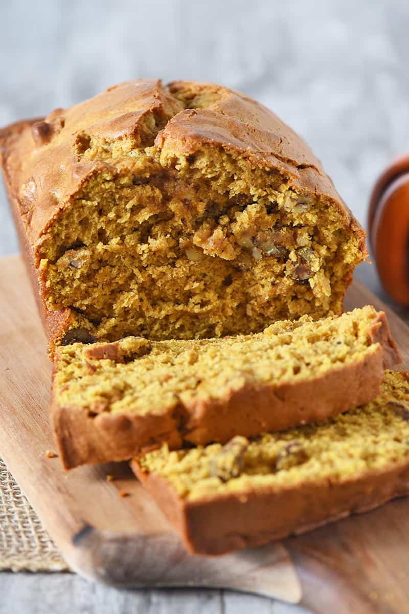 best pumpkin bread recipe, sliced on cutting board