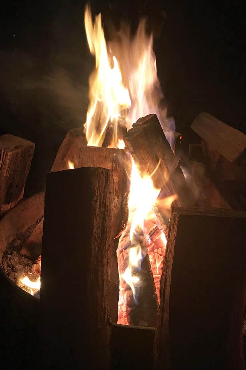 campfire while camping at Petit Jean State Park in Arkansas