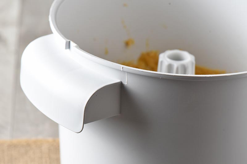 handle on WonderMix kitchen mixer bowl with pumpkin bread recipe dough inside bowl