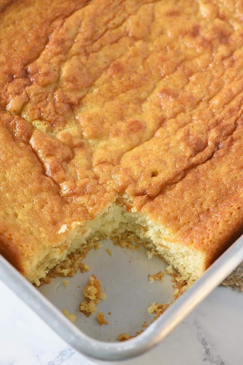 sliced yellow cake in cake pan