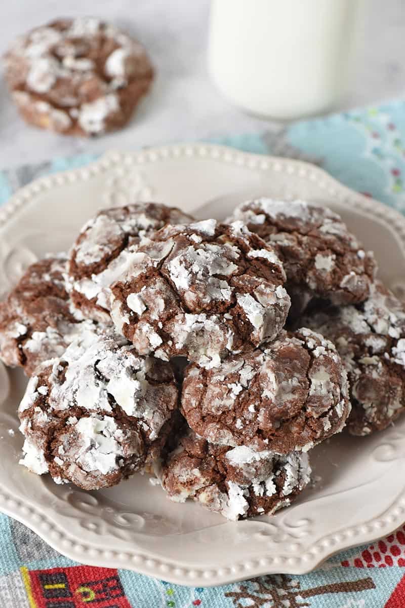 chocolate crinkles piled on white plate, festive chocolate mint Christmas cookies recipe