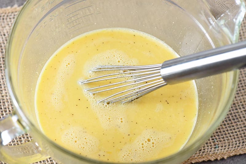 beating eggs and heavy whipping cream for breakfast muffins recipe