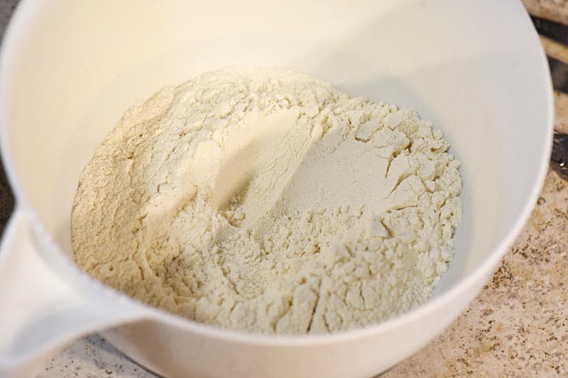 sifted dry ingredients for butterbeer pancake recipe in white mixing bowl