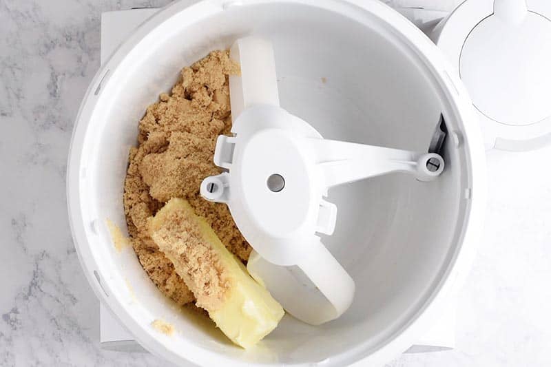 creaming butter and brown sugar for chocolate chip cookies from scratch, in large white mixer