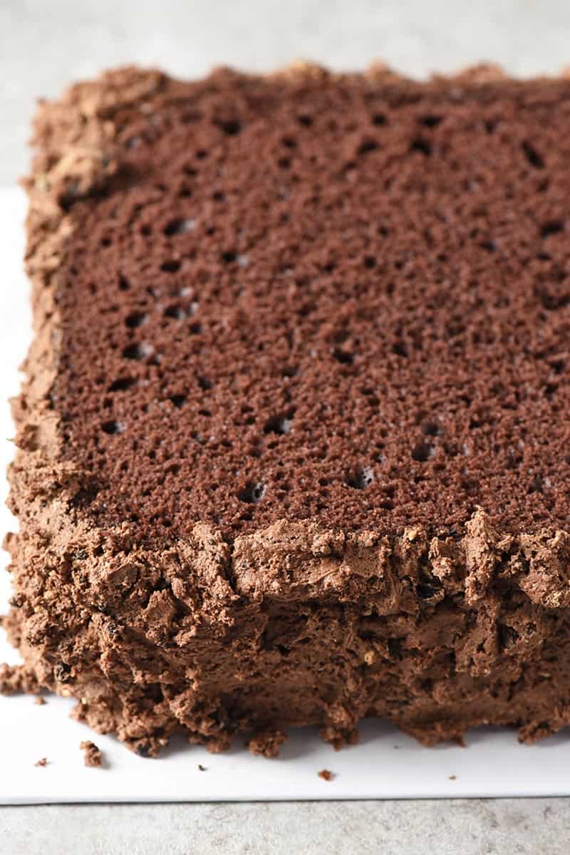 peanut butter Oreos mixed with buttercream to make a dirt icing for grass block Minecraft cake