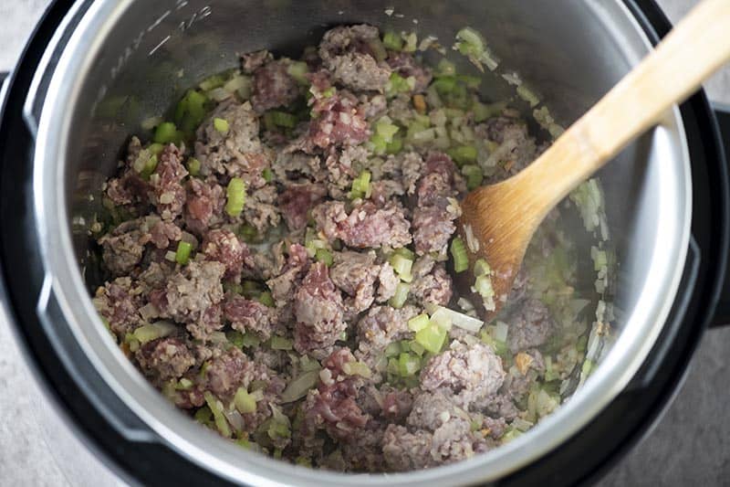 browning sausage with vegetables in Instant Pot pressure cooker