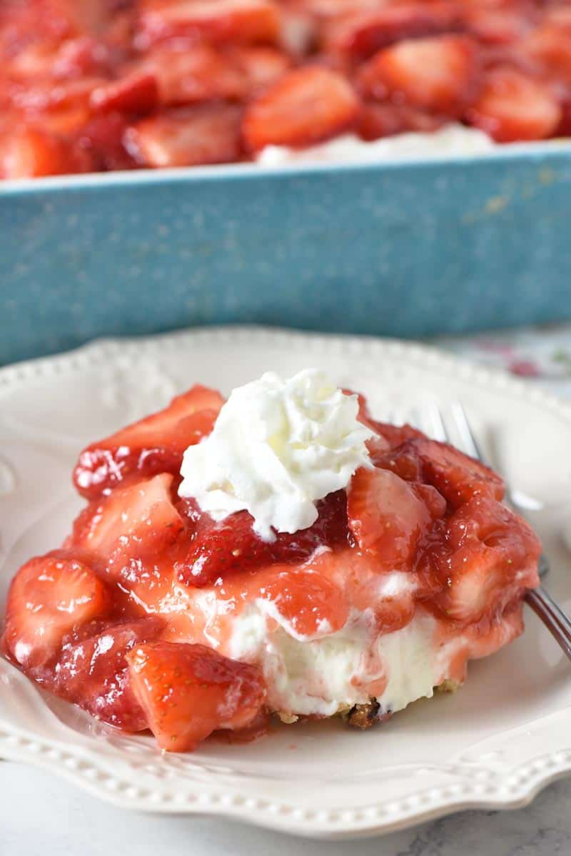 slice of strawberry yum yum dessert on white plate
