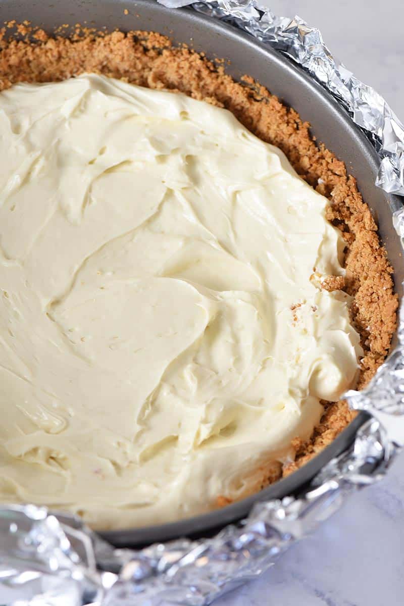 creamy filling for strawberry swirl cheesecake in graham cracker crust in springform pan