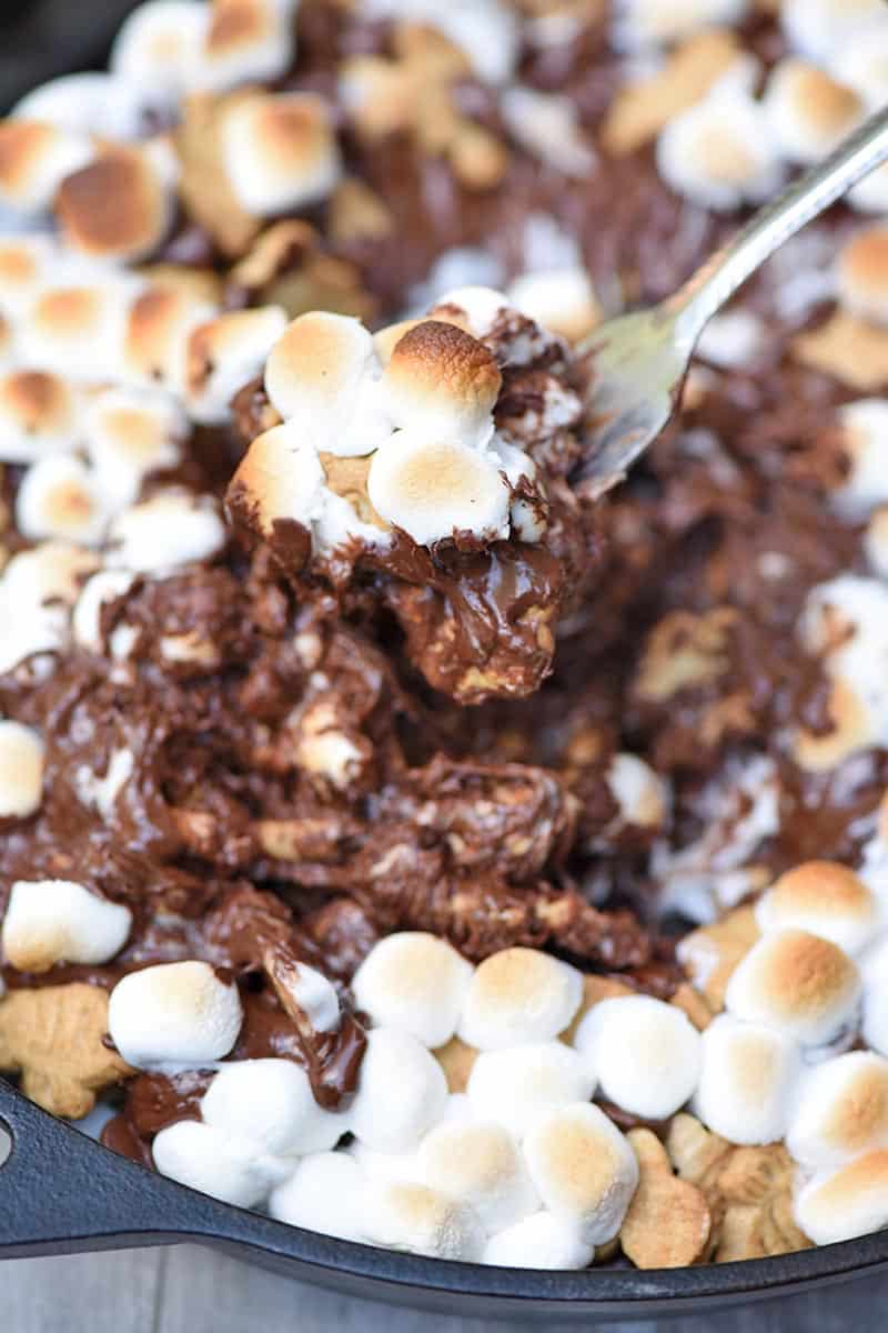 easy skillet s'mores with fork in cast iron skillet