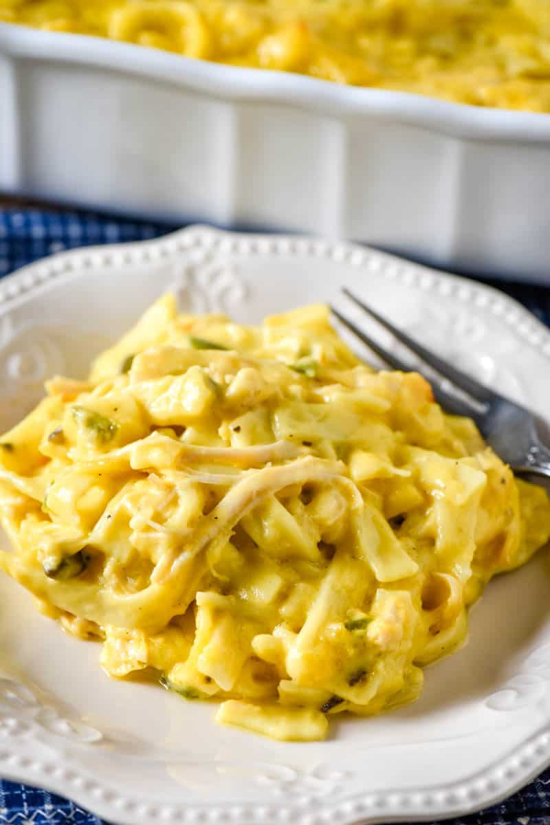 leftover turkey casserole on white plate with fork