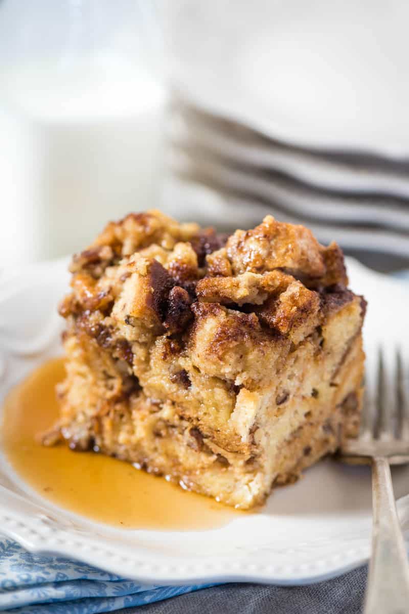 slice of Crock Pot French toast casserole on white plate with fork