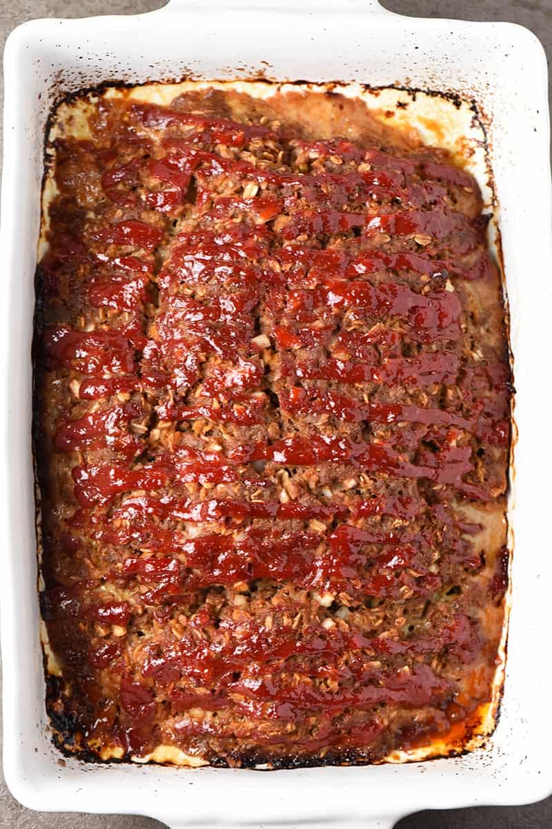 homemade easy meatloaf recipe with oats in a white baking dish