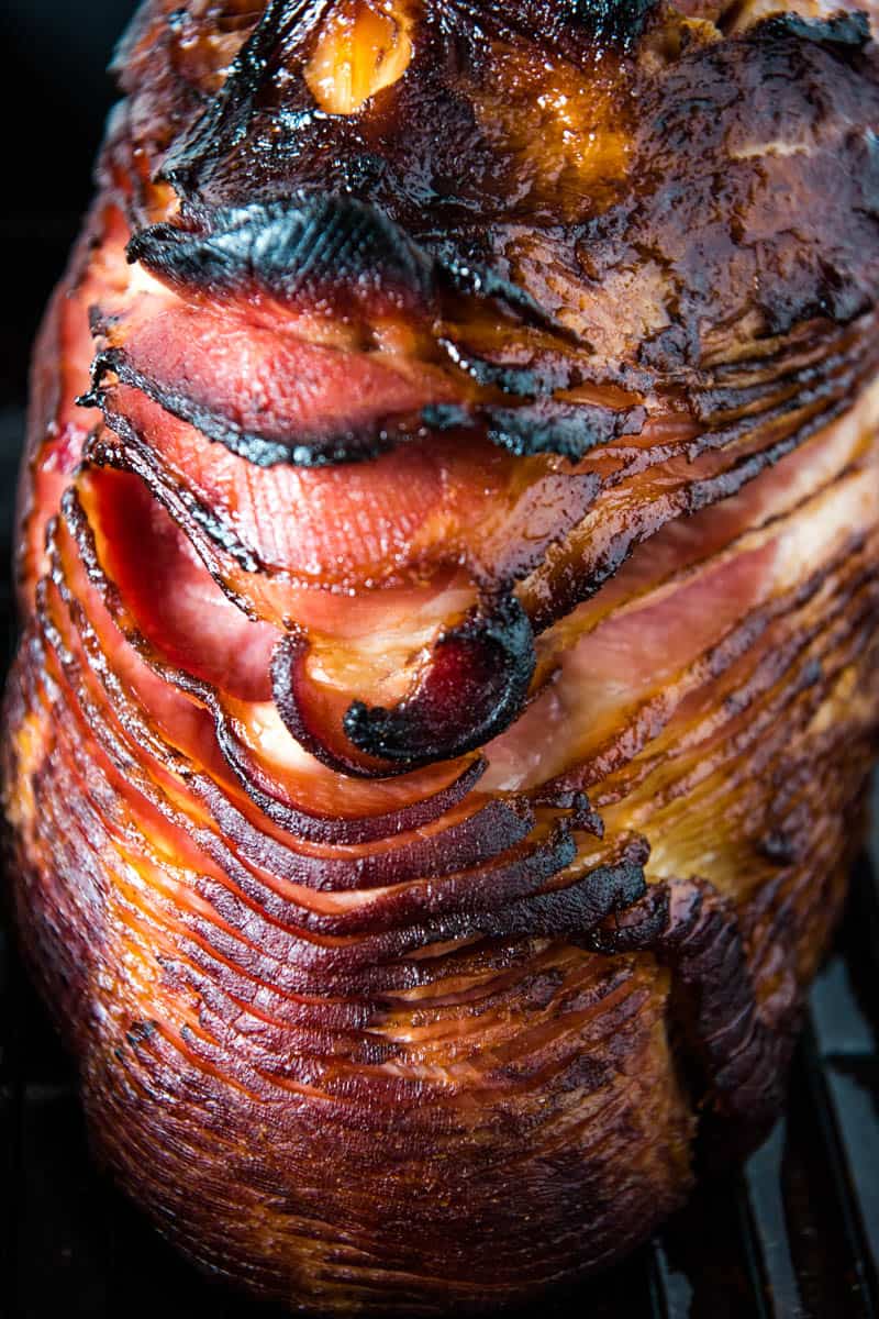 pre-cooked ham baked in the oven, sitting in roasting pan