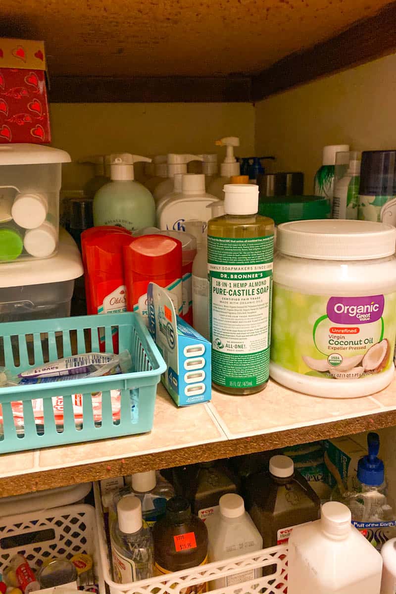 hygiene, first aid, and household supplies in a working pantry cabinet