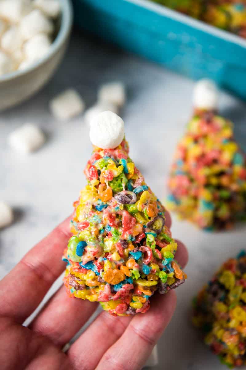 hand holding Christmas Fruity Pebbles treat