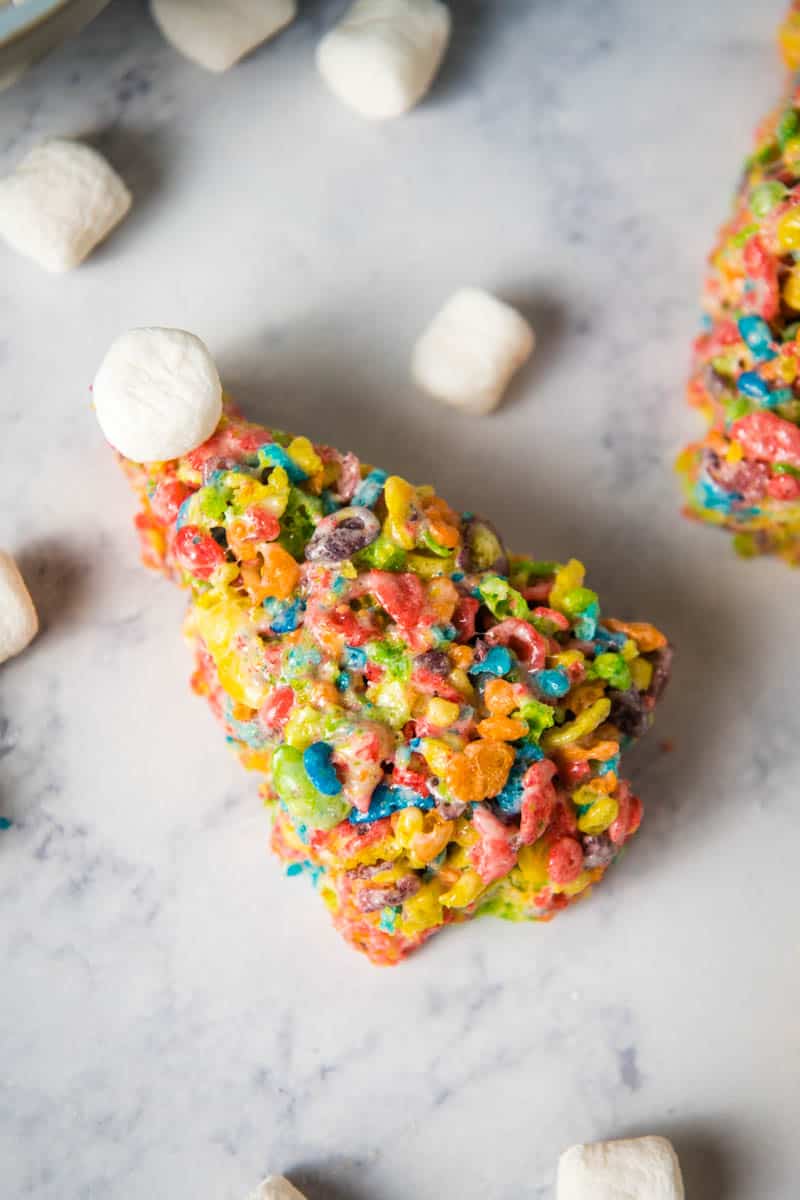 Fruity Pebbles Christmas trees with mini marshmallow stars on white marble countertop