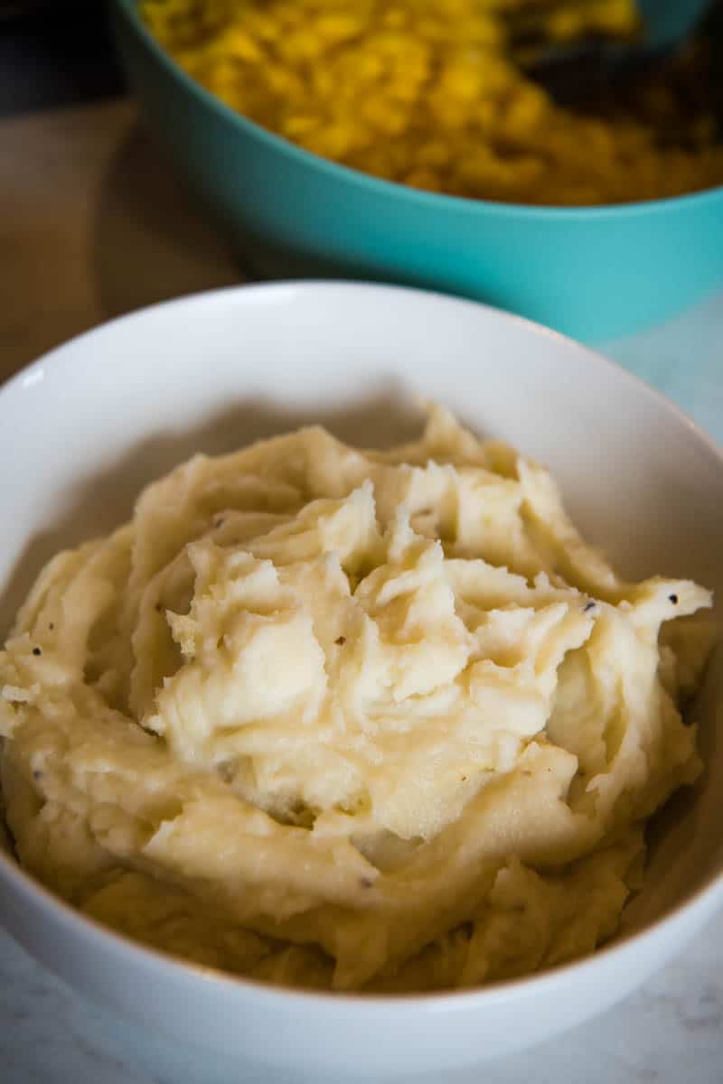 mashed potatoes for KFC chicken bowl in white serving bowl