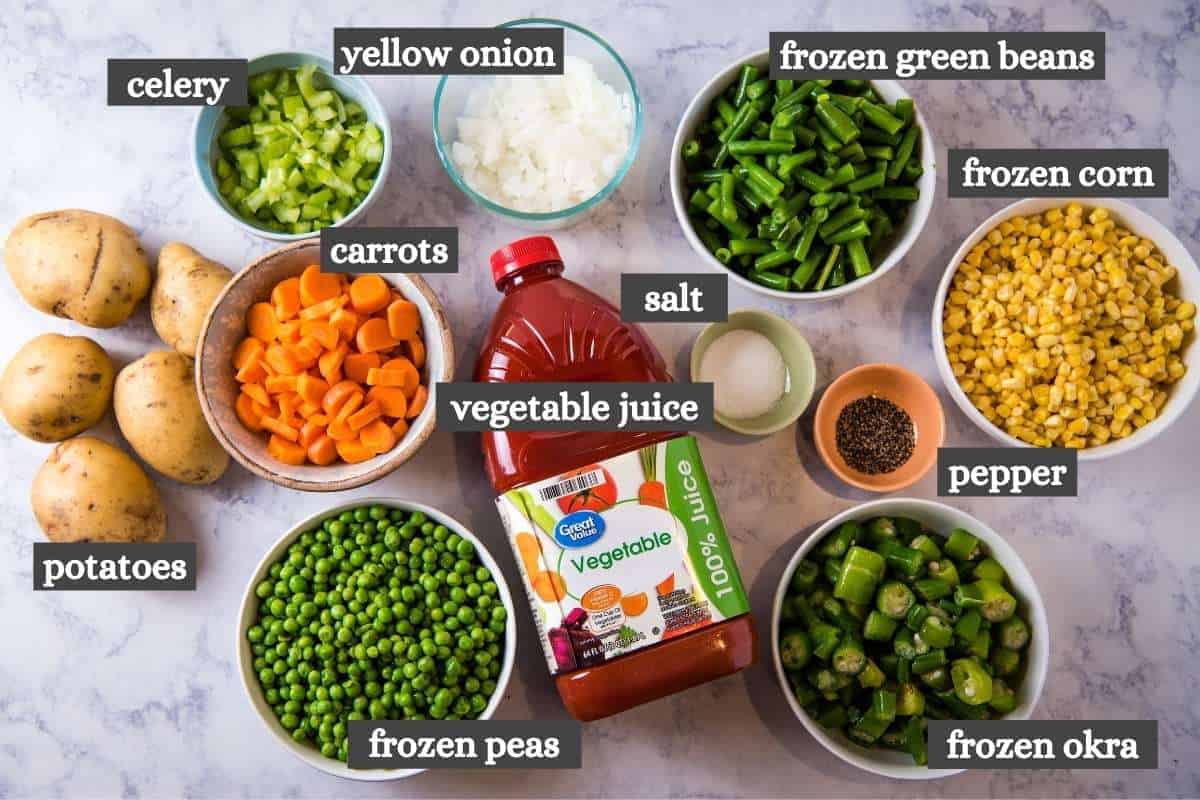 easy V8 vegetable soup recipe ingredients on white marble countertop