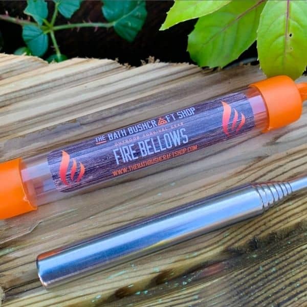 pocket sized fire bellows for helping start a fire while camping