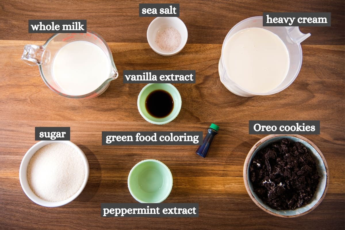 mint Oreo ice cream ingredients on wood countertop