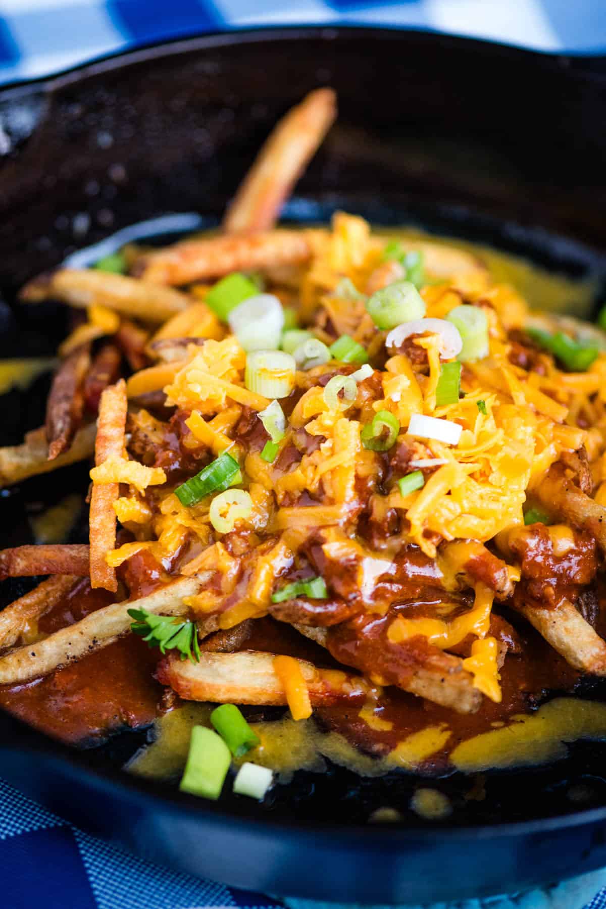 Loaded Chili Cheese Fries in a Cast Iron Skillet