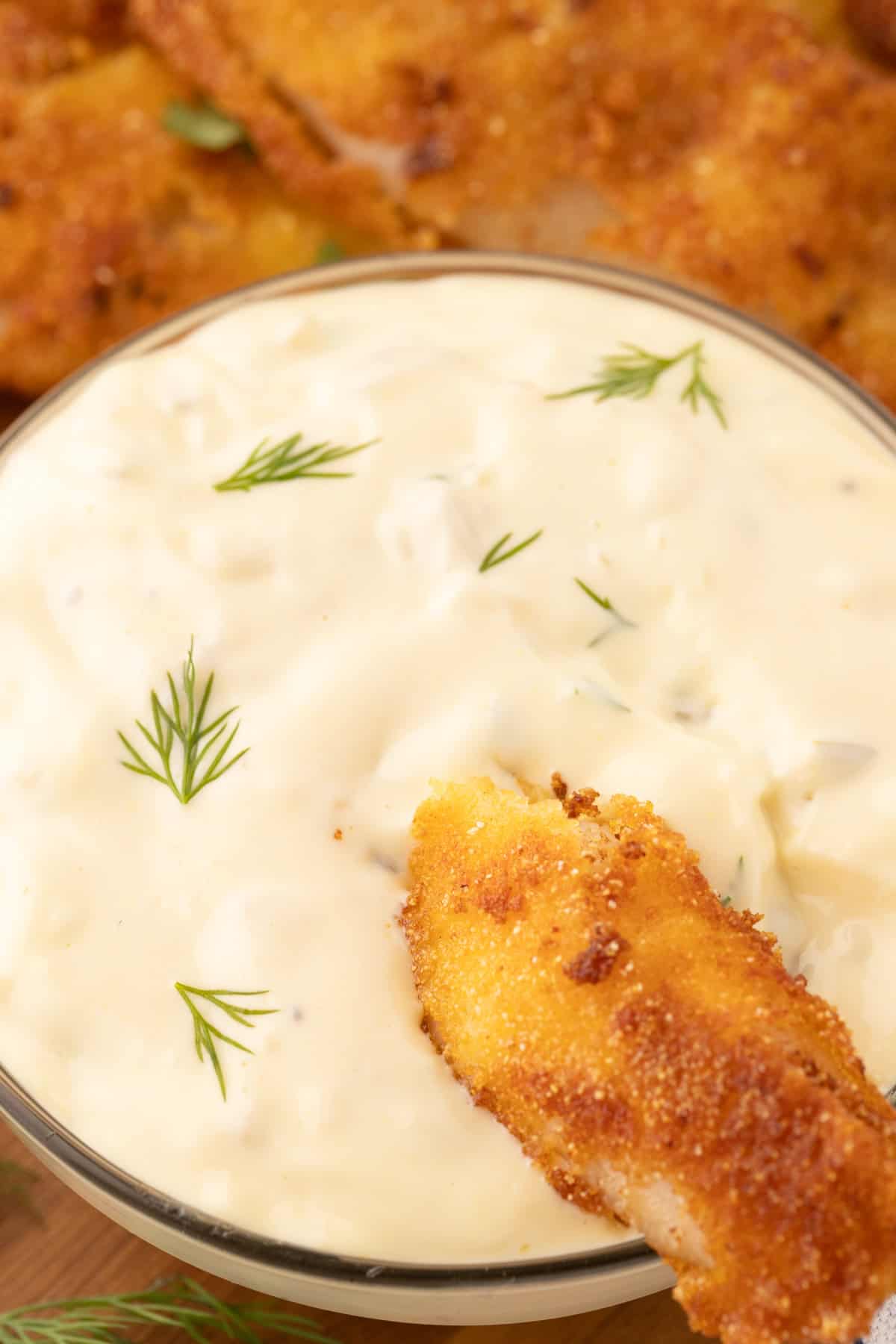 fried crappie dipped in creamy tartar sauce